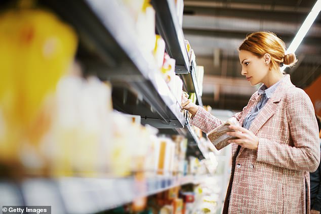 A woman pictured shopping for gluten-free products (stock image)